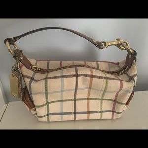 Coach limited edition tattersall legacy pouch